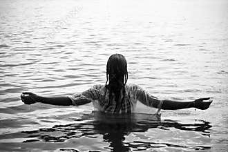 Raised arms woman