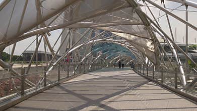 Sun light helix bridge walking tourist marina bay sands view singapore