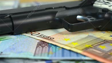 Gun on euro bills