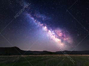 Landscape with Milky Way. Night sky with stars at mountains