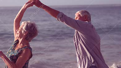 Cute senior couple dancing