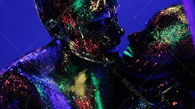 Sexual people body under ultraviolet light
