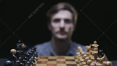 A chessboard appears in front of a player
