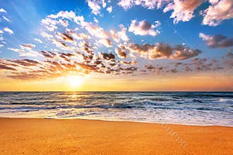 Brilliant ocean beach sunrise.