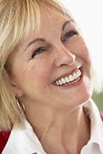 Middle Aged Woman Smiling Cheerfully