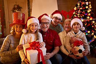 Happy family with Christmas gifts