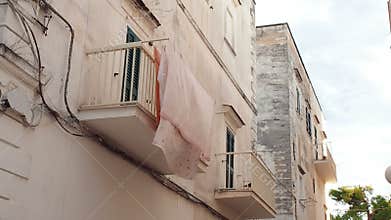 Clothes hanging to dry balcony