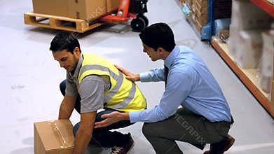 Supervisor interacting with worker