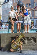 Street performers, dressed in Bavarian traditional costumes