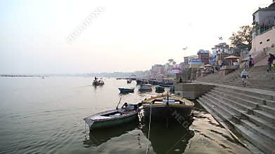 Boats anchored on the ghats of Ganges river in Varanasi.