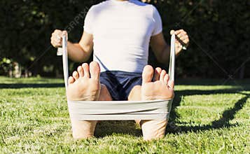 Man Exercising with Resistance Bands