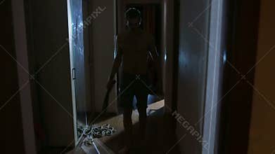 Zombies maniac with a knife down the hallway. horror