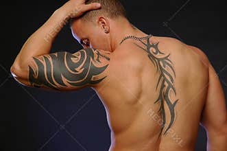 Male with tattoos