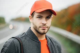 Young man in baseball cap