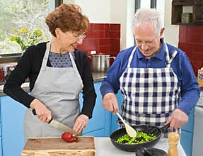 Senior couple cooking
