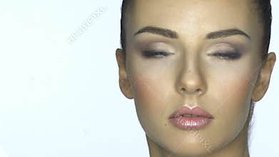 Beautiful young woman face close-up.