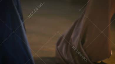 4k Close-up of a pink dress, a girl dances and spinning around in an evening dress.