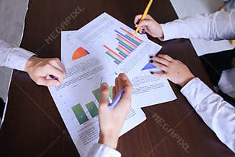 Woman Shows to Man Graph And Documents. Guys Preparing For Proje
