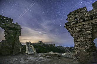 Ancient ruins and night sky above
