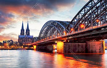 Cologne Cathedral and Hohenzollern Bridge at sunset - night