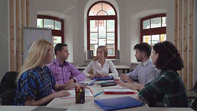 Business meeting in creative startup company.