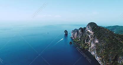 Aerial drone video of iconic tropical beach and resorts of Phi Phi island