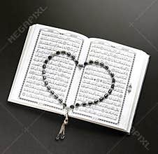 Holy Book of Quran With Heart Shaped Rosary