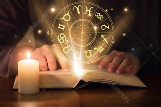 Man reading astrology book