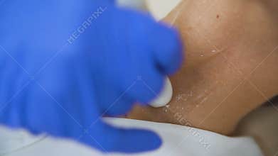 Young Woman Doing Neck Ultrasound Examination At Hospital