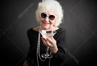 Cool grandma havinga a drink