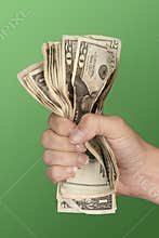 Woman gripping cash