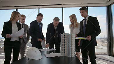 Business meeting of architects and investors