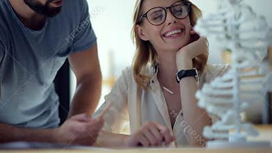 Scaled up look on students working on biological project