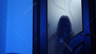 A ghost girl in the house. The spirit of a little girl. Scary scene of a terrible woman. The zombie knocks at the