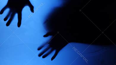 A ghost girl in the house. The spirit of a little girl. Scary scene of a terrible woman. The zombie knocks at the