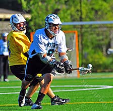 Lacrosse reach for the ball