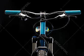 Mountain bicycle photography in studio, cushioning bike frame parts, handle bar and brakes