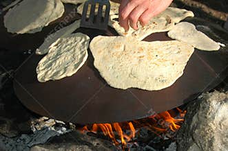 Outdoor Cooking Of Pita Bread