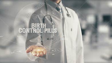 Doctor holding in hand Birth Control Pills