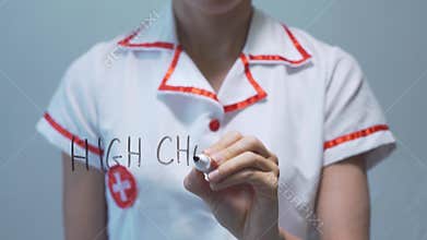 High cholesterol, Female doctor writing on transparent screen