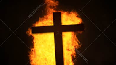 Cross silhouette fire pyre flame detail
