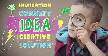 Boy holding magnifying glass next to colorful creative concept idea graphics