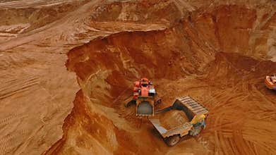 Mining excavator working at sand quarry. Mining industry