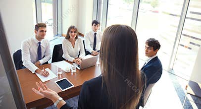 Business conference presentation with team training flipchart office.