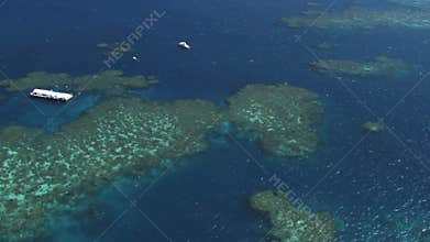 Australian great barrier reef aerial with pontoons for snorkeling