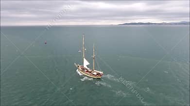 Sailing boat leaving port. Poolbeg. Dublin. Ireland