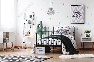 Black blanket on kid`s bed