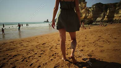 Woman walking on Dona Ana Beach