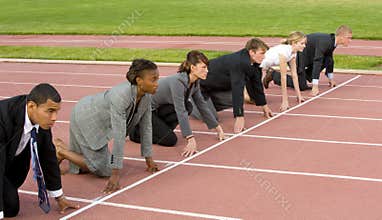 Business People Kneeling at the Starting Line