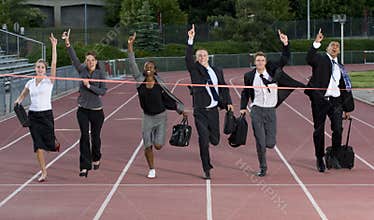 Business People Crossing the Finish Line